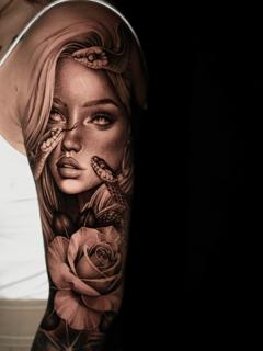 Realism woman with snakes tattoo by @lisa__ink