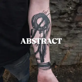 Abstract blackwork abstract brushstrokes tattoo by @lorr.ink