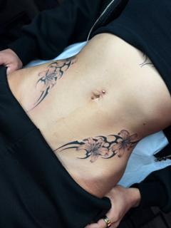Tribal tribal flowers tattoo by @lucysaffrontattoo