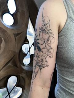 Fine line floral orchid tattoo by @lucysaffrontattoo