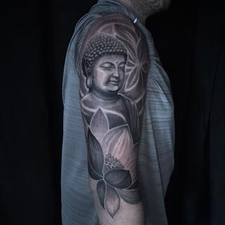 Realism buddha and lotus tattoo by @luisjtattoos