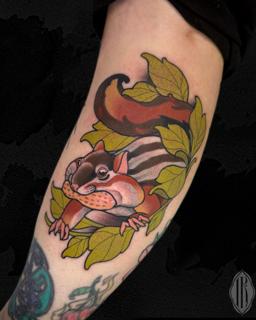 Neo-traditional squirrel with nut tattoo by @lukaskaytattoo