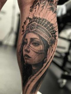 Realism feathered headdress woman tattoo by @mads.flugt