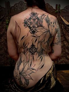 Blackwork floral ornamental tattoo by @manishi_inkatattoo