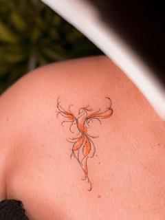 Fine line abstract phoenix tattoo by @katerinedovasink