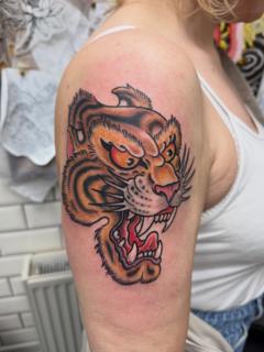Traditional tiger head tattoo by @not_cultured_tattoo