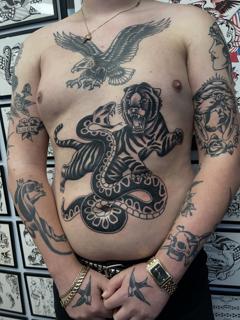 Traditional tiger and snake tattoo by @marc_studio_ink