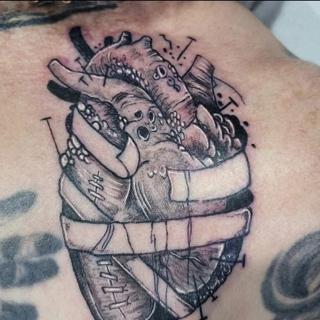 Illustrative anatomical heart tattoo by @blood_sweat_and_tears_tattoo