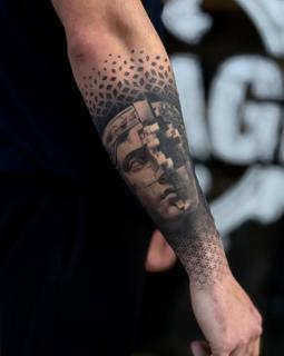 Realism geometric statue tattoo by @garagetattooshop