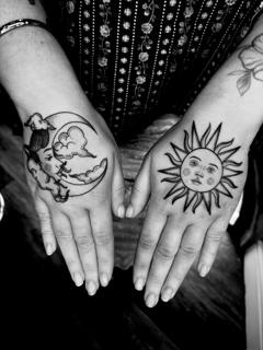 Traditional sun and moon tattoo by @mariamanzitattoo