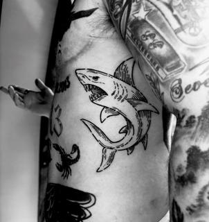 Traditional shark tattoo by @mariamanzitattoo