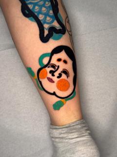 Japanese traditional okame mask tattoo by @darksumi_tattoo