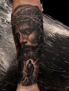 Realism jesus portrait tattoo by @mariusz_detka_tattoo