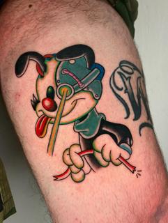 Traditional robotic cartoon tattoo by @quipstertattoos