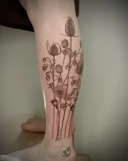 Fine line botanical wildflower bouquet tattoo by @martatattoos