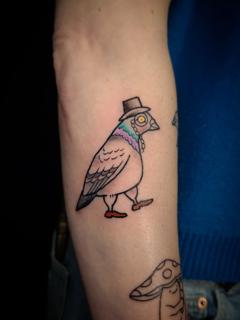 Illustrative dapper pigeon tattoo by @marthmallow.tatts