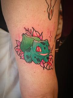 Anime pokemon bulbasaur tattoo by @marthmallow.tatts