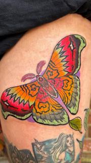 Traditional colorful butterfly tattoo by @mattwebbtattoo