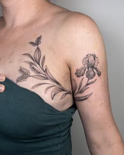 Fine line floral iris tattoo by @meganbirdtattoo