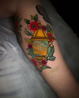 Neo-traditional floral lantern tattoo by @meg.tattz
