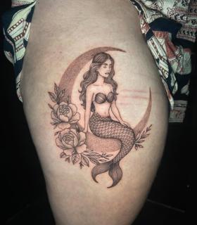 Dotwork mermaid moon floral tattoo by @megz.ink