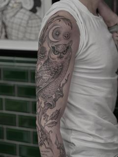Blackwork owl and moon tattoo by @melina_tattoo