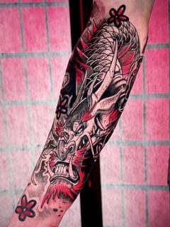 Japanese dragon head tattoo by @miguel.tattooer