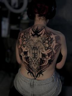 Blackwork wolf and tribal tattoo by @_mikotattoo