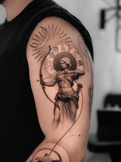 Realism archer goddess tattoo by @minaltt