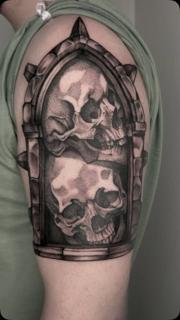 Realism skulls in frame tattoo by @mitchmicallef
