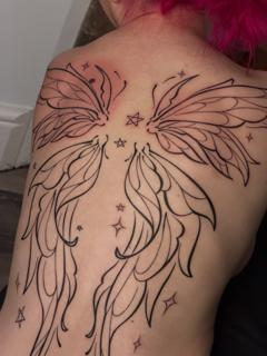 Fine line angel wings tattoo by @moz.tattoos