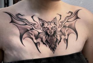 Blackwork bat cat tattoo by @psi.xi.tatt