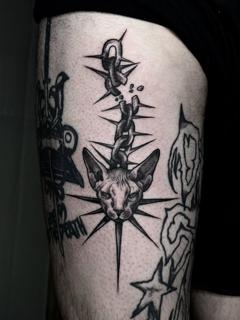 Blackwork spiked cat chain tattoo by @ayp.nia