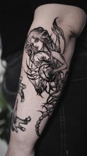 Blackwork gothic siren orb tattoo by @ayp.nia