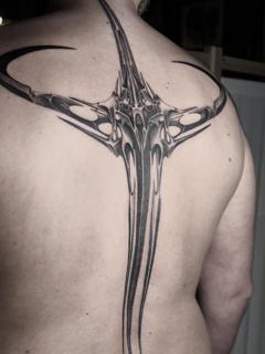 Biomechanical blackwork abstract weapon tattoo by @ayp.nia