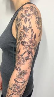 Fine line floral branches tattoo by @nikole_lowe