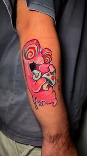 Illustrative melting pizza tattoo by @peri_tattoo_