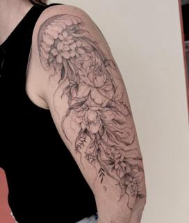 Fine line floral jellyfish tattoo by @tattoopaiges