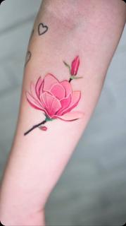 Realism pink magnolia tattoo by @kristeake.tattoo