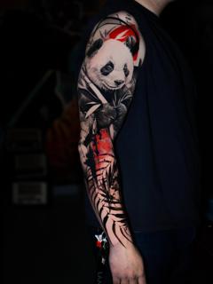 Realism panda with bamboo tattoo by @dast.one