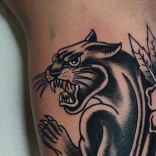 Traditional panther tattoo by @panosntolas