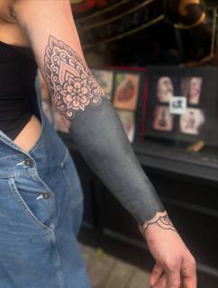 Blackwork ornamental sleeve tattoo by @parispamelatattoo