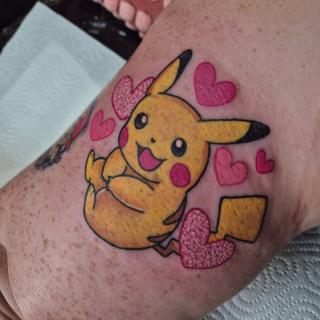 Anime pikachu with hearts tattoo by @pixierobsontattoo