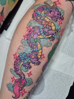 Anime colorful dragon tattoo by @pixierobsontattoo