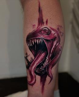Realism creature head tattoo by @plamenkozarov