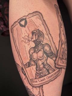 Illustrative knight tarot card tattoo by @poppyoliviatattoo