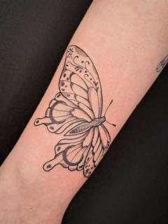 Fine line ornamental butterfly tattoo by @poppyoliviatattoo