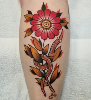 Traditional flower and snake tattoo by @rabtattoo