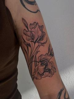 Fine line floral design tattoo by @raniatattoos