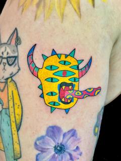 Illustrative cartoon multi-eyed monster tattoo by @antistress_tattoo